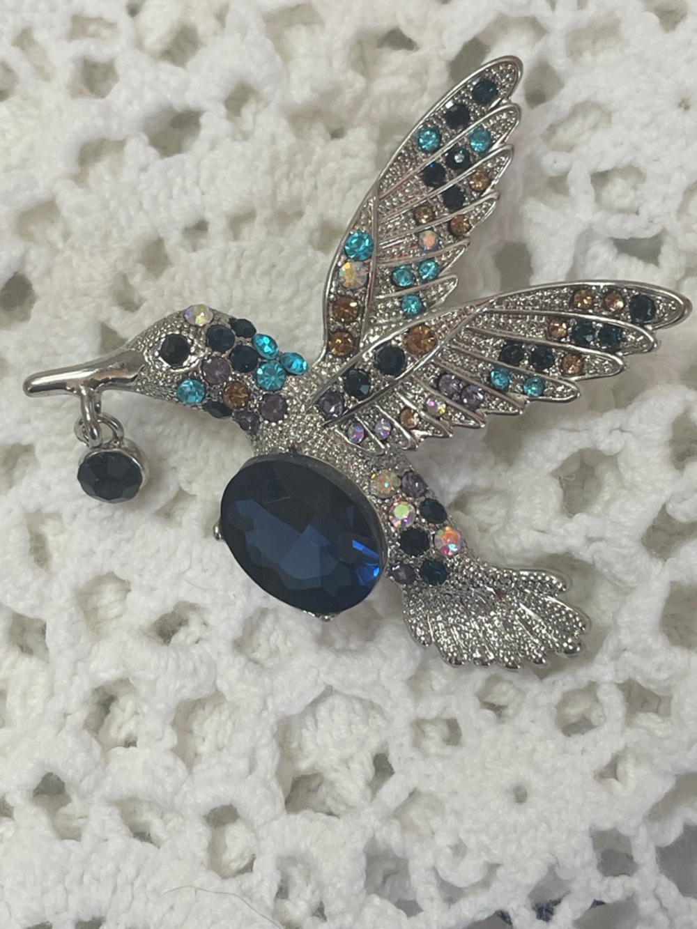 Crystal Hummingbird Brooch with Blue Center Stone and hook closure 2”